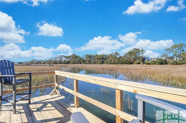 view of dock with a water view