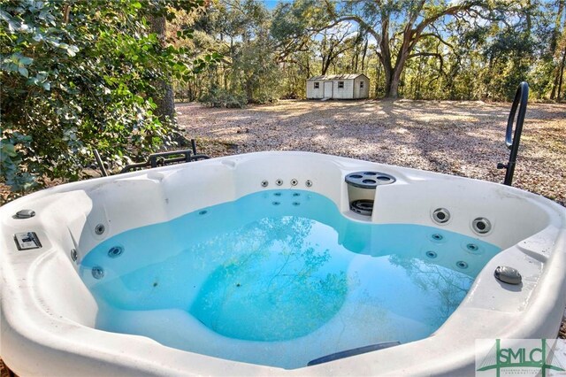 exterior details featuring a hot tub