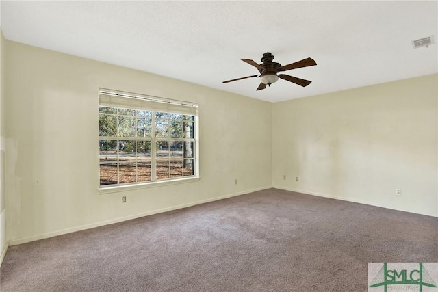 carpeted empty room with ceiling fan