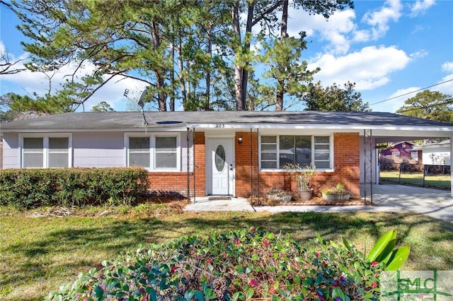 single story home featuring a front lawn and a carport