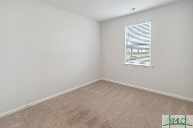 unfurnished room with carpet