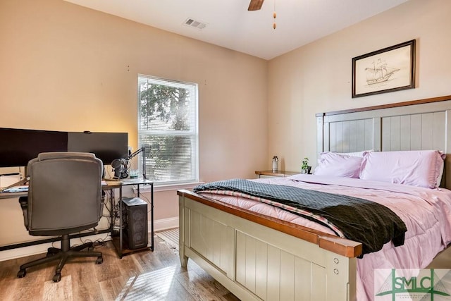 bedroom featuring ceiling fan and light hardwood / wood-style floors