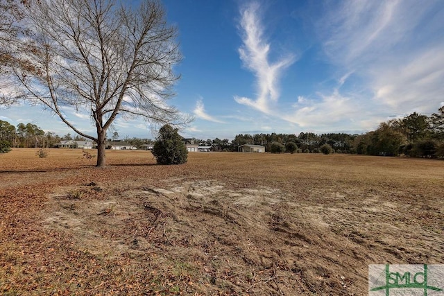 exterior space with a rural view