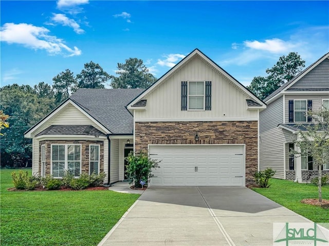 view of front of property featuring a garage and a front yard