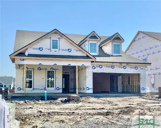 property in mid-construction with an attached garage