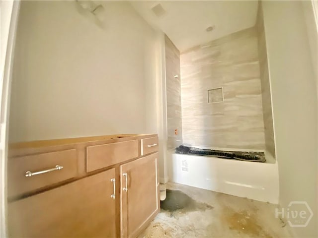 bathroom with unfinished concrete floors