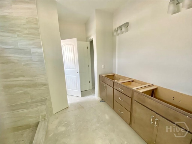 bathroom featuring concrete floors