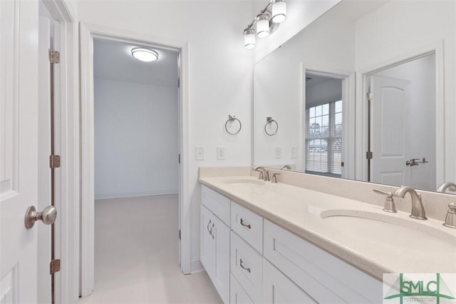 bathroom featuring tile patterned floors and vanity