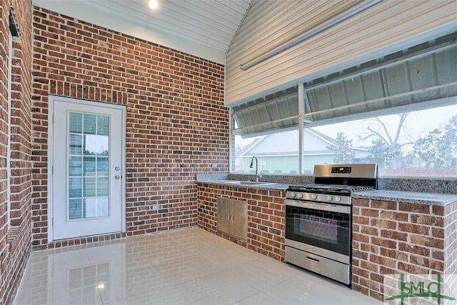 interior space featuring area for grilling and sink