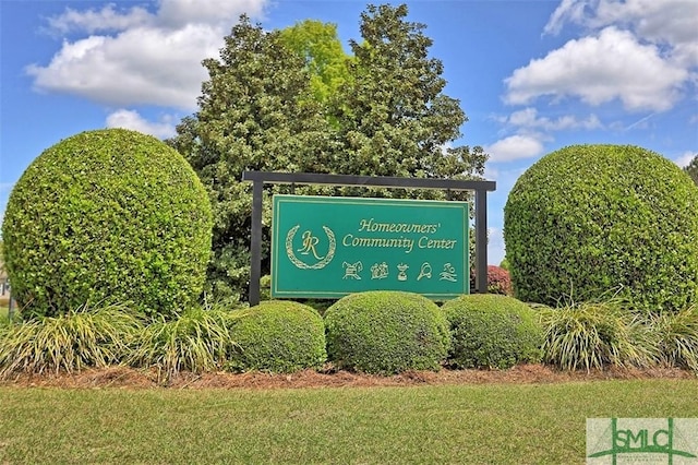 view of community sign