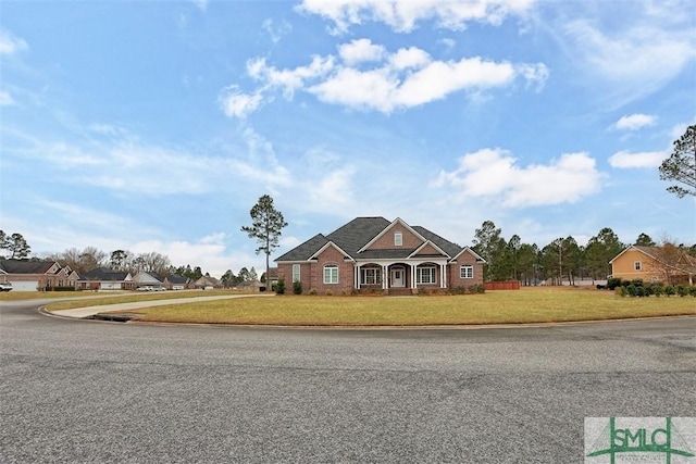 view of front of home with a front lawn