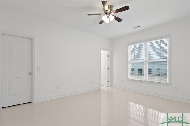 unfurnished room featuring ceiling fan