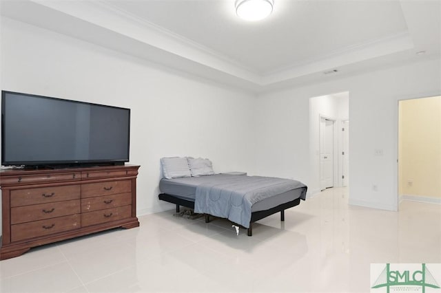 tiled bedroom with a raised ceiling and crown molding