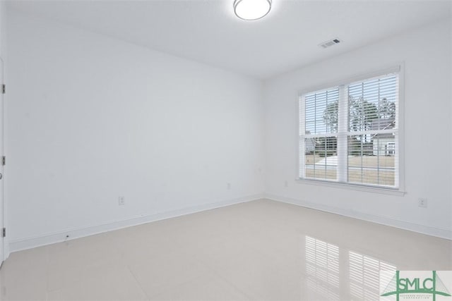 view of tiled spare room