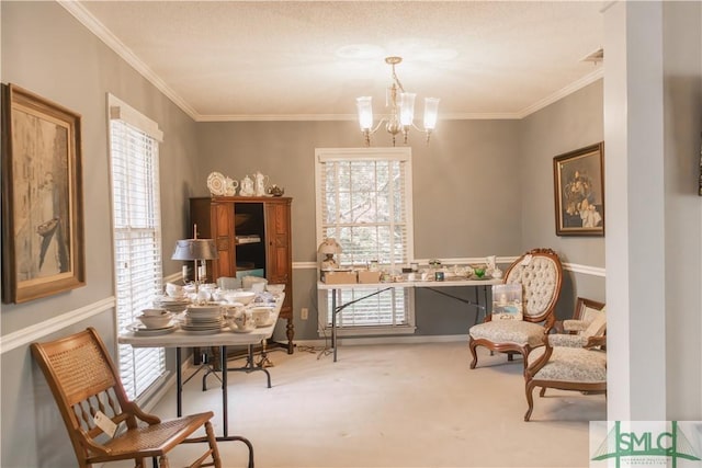 sitting room with ornamental molding, carpet floors, a wealth of natural light, and a notable chandelier