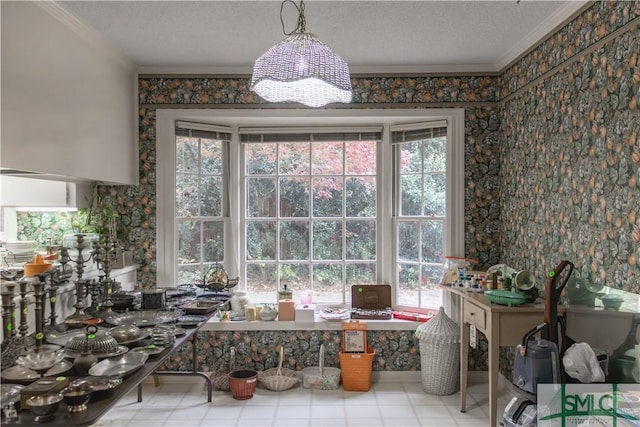 dining space with crown molding and a textured ceiling