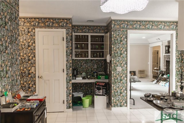 kitchen with an inviting chandelier and ornamental molding