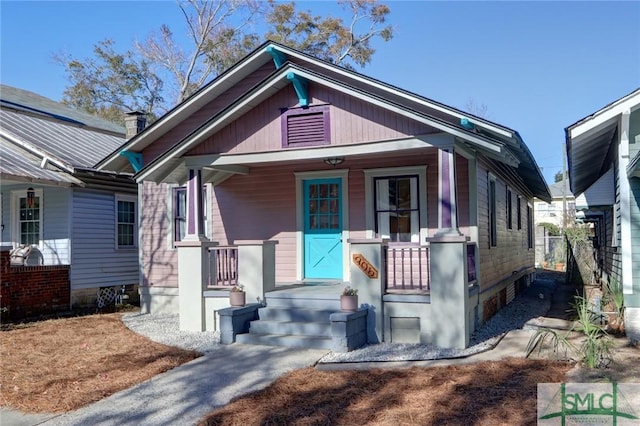 bungalow-style home with covered porch