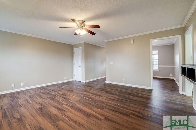 spare room with ceiling fan, dark hardwood / wood-style flooring, ornamental molding, and a textured ceiling