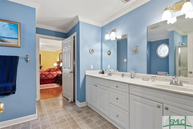 bathroom featuring an enclosed shower, crown molding, and vanity