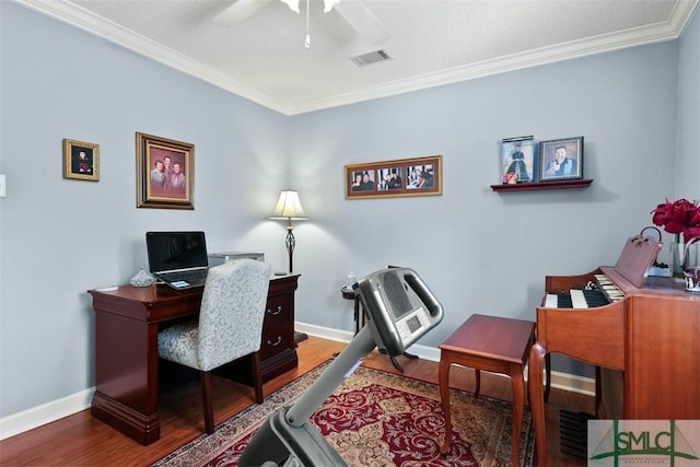 office space with wood-type flooring, ceiling fan, and crown molding