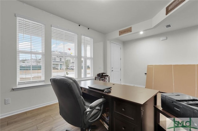 office area with light hardwood / wood-style flooring