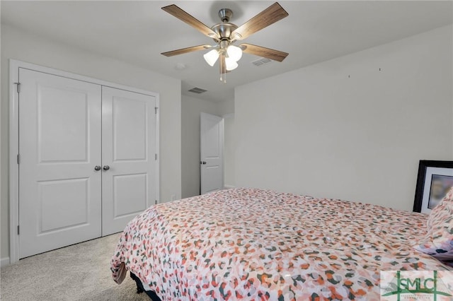 bedroom featuring ceiling fan and a closet