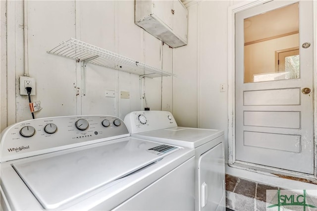 washroom with washer and dryer