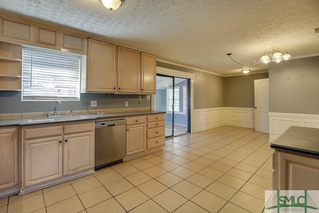 kitchen featuring dishwasher, a textured ceiling, decorative light fixtures, and sink