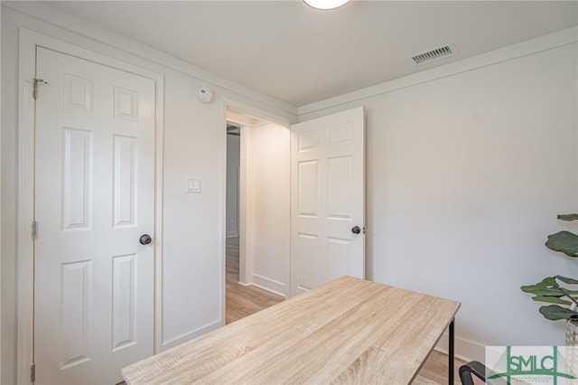 home office with light wood-type flooring