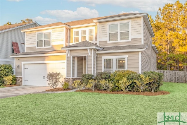 view of front of house featuring a front lawn and a garage