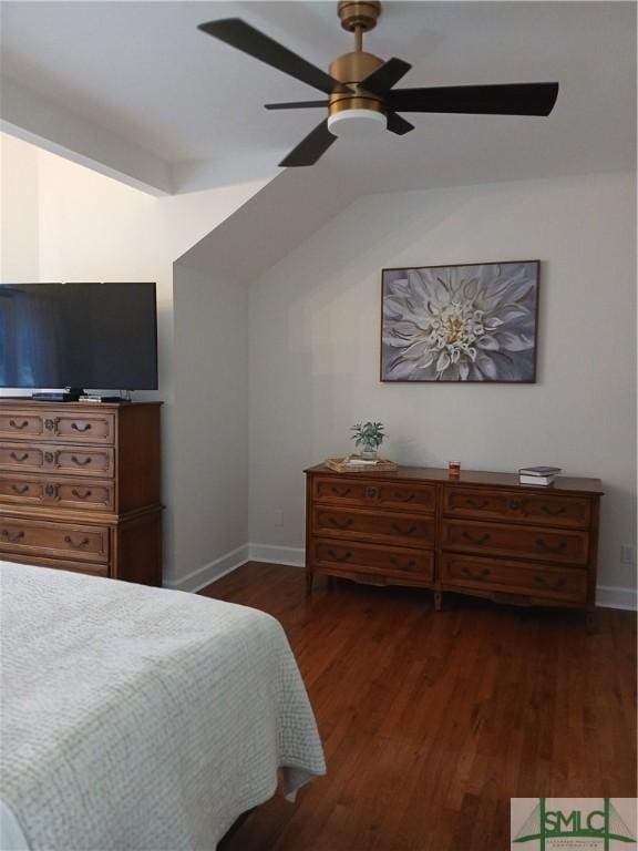 bedroom with ceiling fan, dark hardwood / wood-style floors, and vaulted ceiling