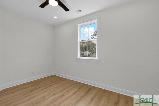 unfurnished room featuring light hardwood / wood-style floors and ceiling fan