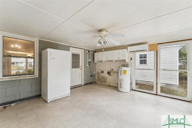 kitchen with electric water heater, white cabinets, white refrigerator, a wealth of natural light, and a wall unit AC