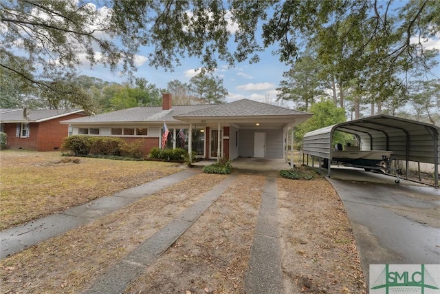 view of front facade featuring a carport