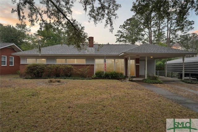 view of front of house with a lawn