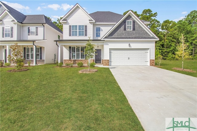 craftsman inspired home featuring a garage and a front yard