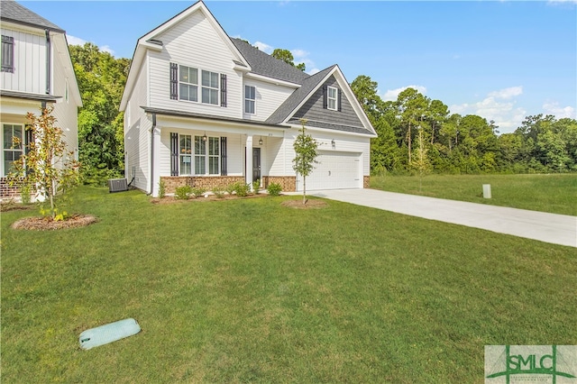 view of front facade with a porch, a garage, central air condition unit, and a front lawn