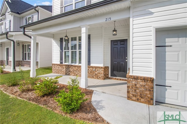 entrance to property with covered porch