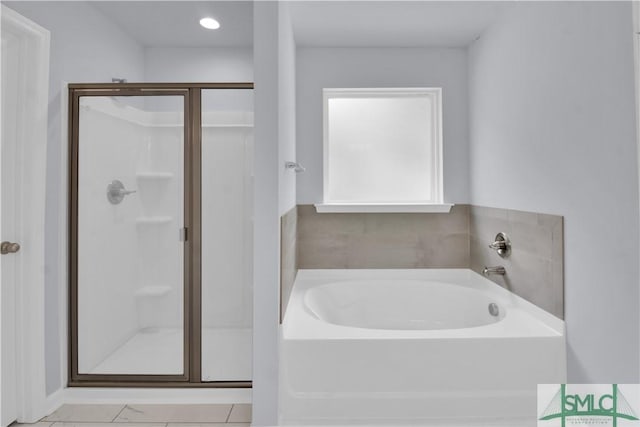 bathroom featuring plus walk in shower