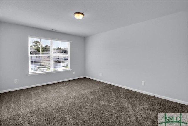 view of carpeted spare room