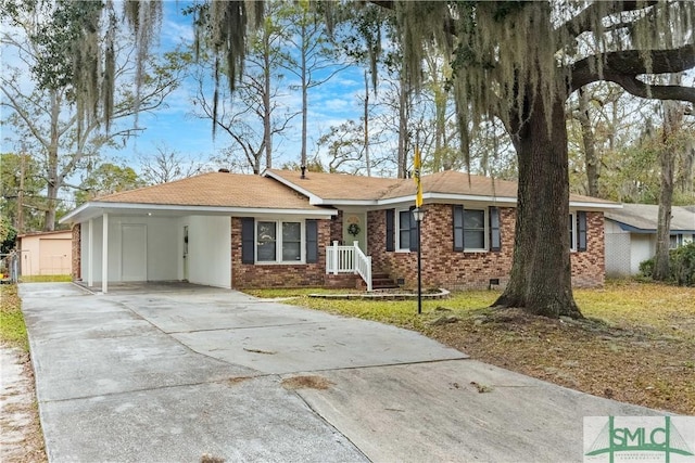 single story home featuring a carport and a garage