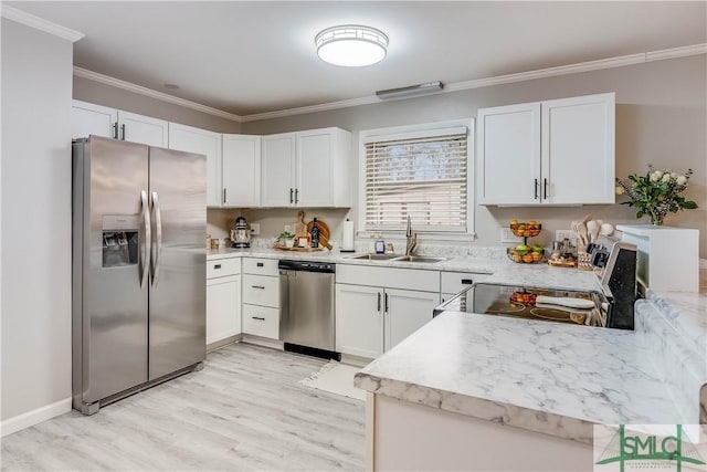 kitchen with crown molding, sink, light hardwood / wood-style flooring, appliances with stainless steel finishes, and white cabinetry