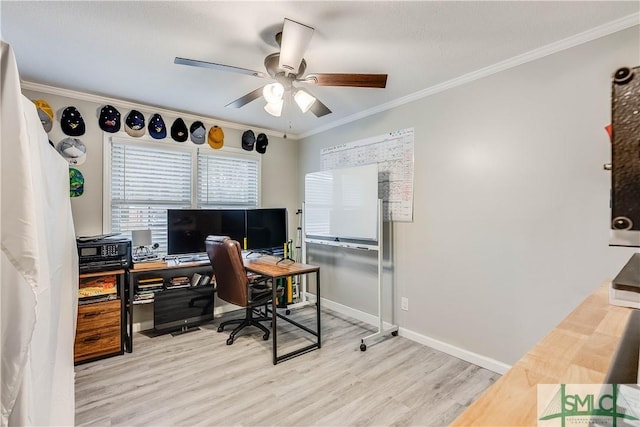 office area with ceiling fan, crown molding, and light wood-type flooring