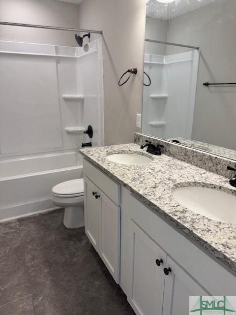 full bathroom featuring shower / bathing tub combination, vanity, and toilet