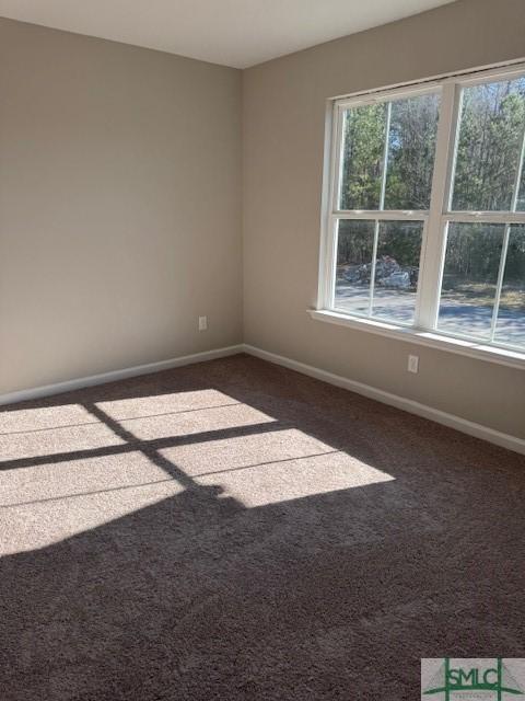 view of carpeted spare room