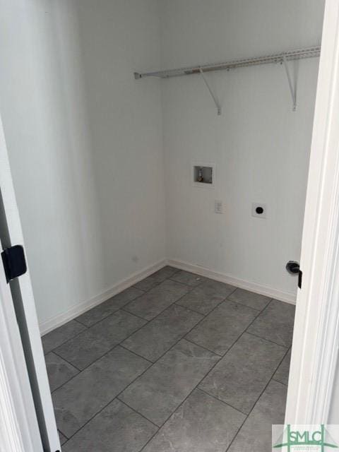 washroom with hookup for an electric dryer and washer hookup