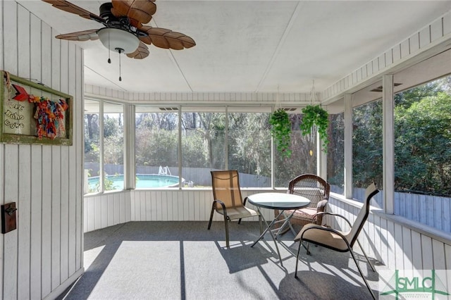 sunroom / solarium with ceiling fan