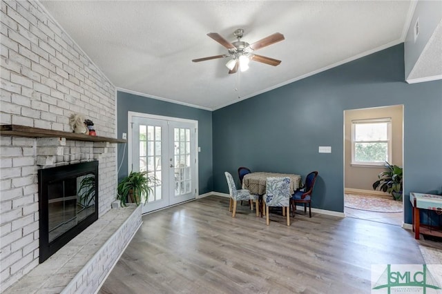 interior space featuring ornamental molding, a wealth of natural light, and french doors