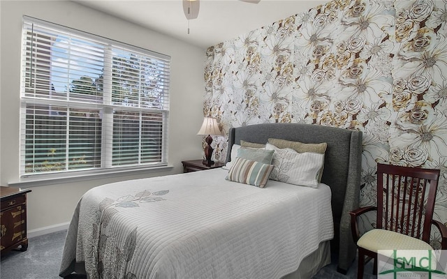 carpeted bedroom featuring ceiling fan